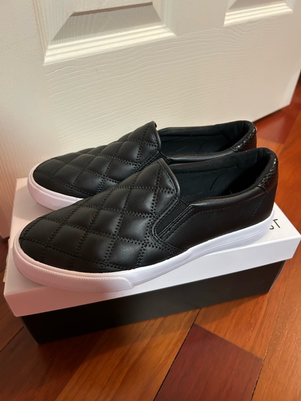 Nine West Quilted Black Slip-On Sneakers